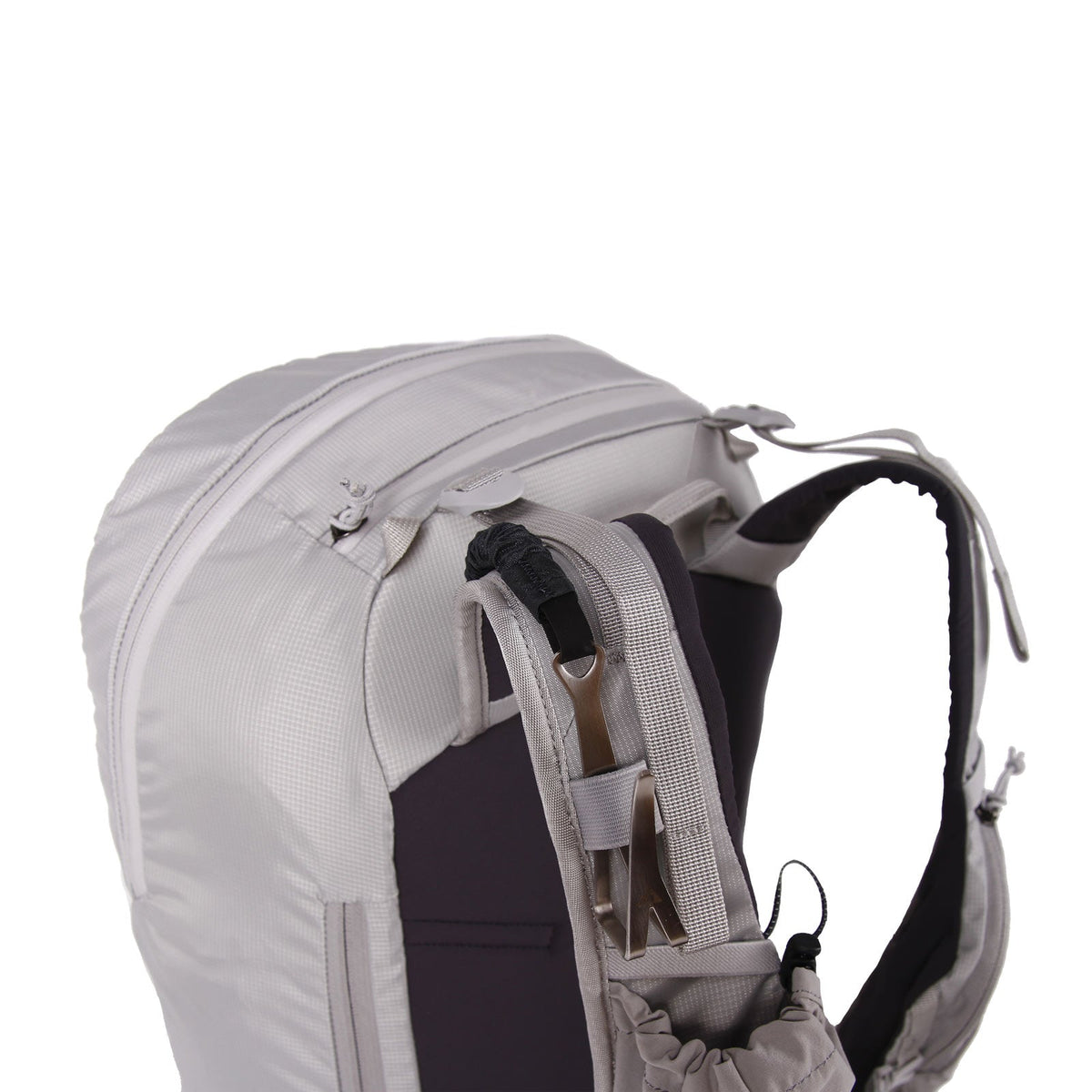 Blue Ice Quick Ski Carry Kit attached to backpack