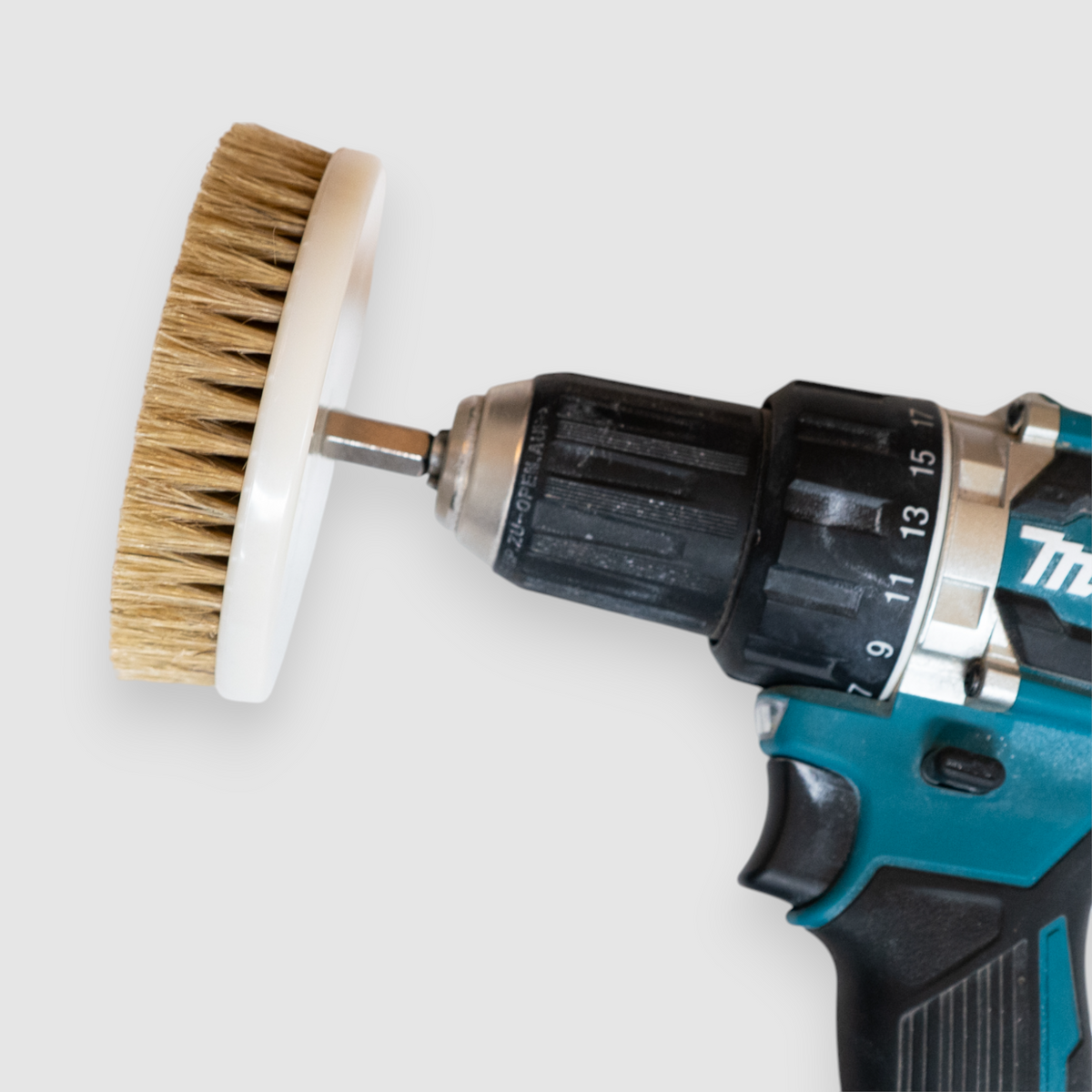 Tension Drill Brush attached to a drill
